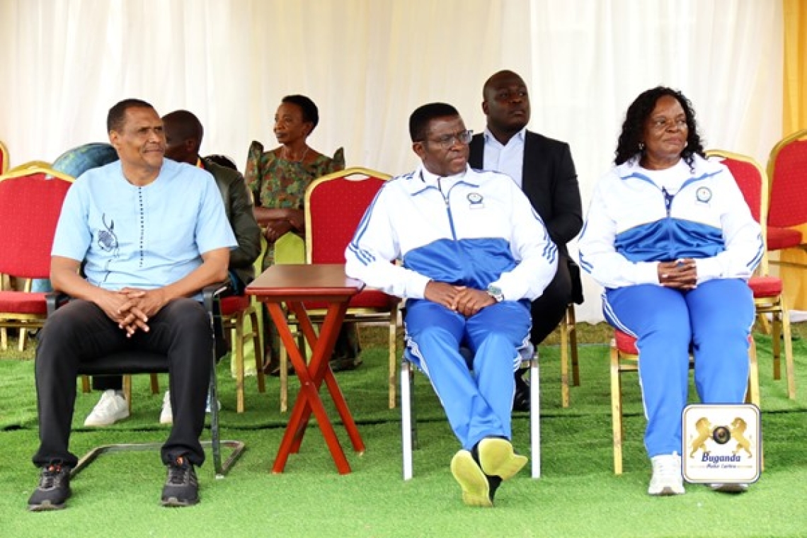 From the left: Omukungu Edger Watson, the chief guest; the Katikkiro in the middle; and his wife